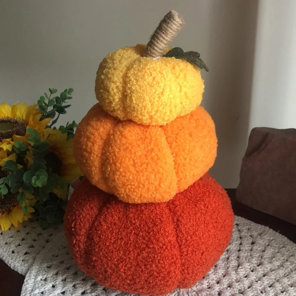 Stacked SHERPA Pumpkins with Smiley Faces